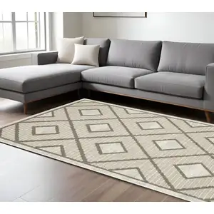 Photo of Beige And Brown Geometric Area Rug