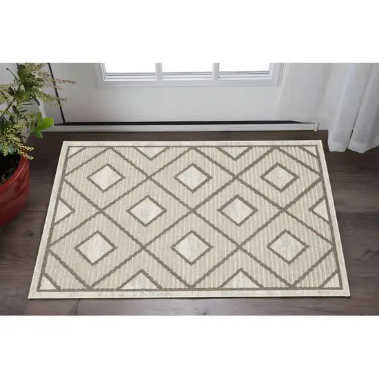 Beige And Brown Geometric Area Rug Photo 1