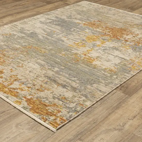 Beige And Gold Abstract Area Rug With Fringe Photo 4