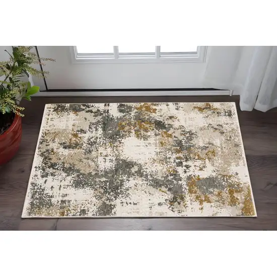 Beige And Gray Abstract Area Rug With Fringe Photo 1