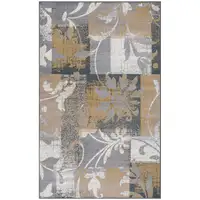 Photo of Beige And Gray Floral Power Loom Distressed Stain Resistant Area Rug
