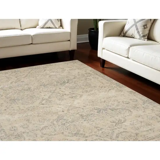 Beige And Gray Geometric Distressed Area Rug Photo 1