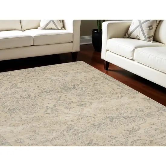 Beige And Gray Geometric Distressed Area Rug Photo 1