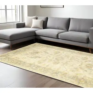 Photo of Beige And Gray Wool Oriental Hand Knotted Area Rug