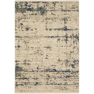 Photo of Beige And Green Abstract Area Rug With Fringe