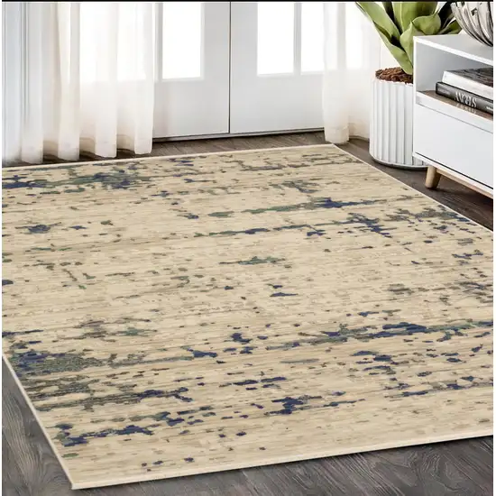 Beige And Green Abstract Area Rug With Fringe Photo 1