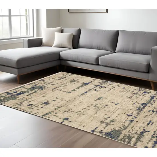 Beige And Green Abstract Area Rug With Fringe Photo 1