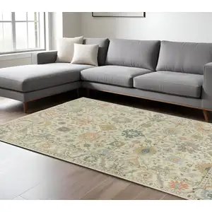 Photo of Beige And Green Wool Oriental Hand Knotted Area Rug With Fringe