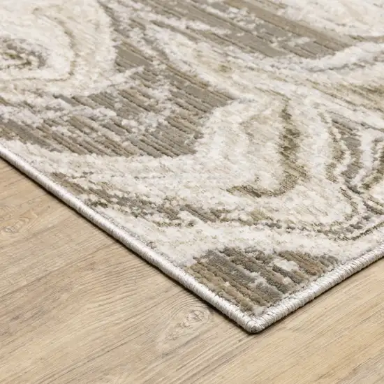 Beige And Ivory Abstract Power Loom Stain Resistant Area Rug Photo 4