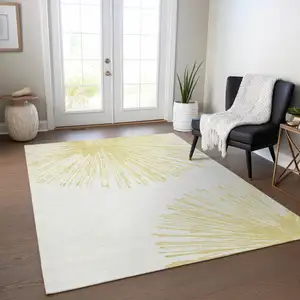 Photo of Beige And Ivory Abstract Washable Indoor Outdoor Area Rug