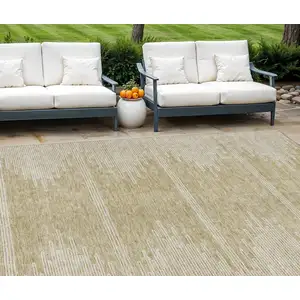 Photo of Beige And Ivory Abstract Washable Indoor Outdoor Area Rug