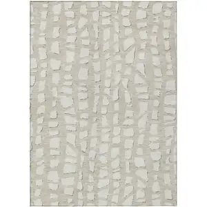 Photo of Beige And Ivory Abstract Washable Indoor Outdoor Area Rug