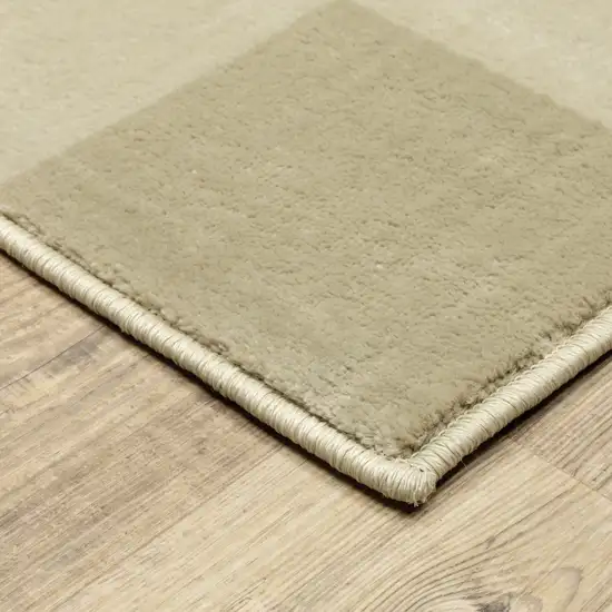 Beige And Ivory Geometric Power Loom Stain Resistant Area Rug Photo 3