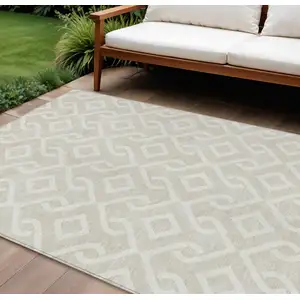 Photo of Beige And Ivory Geometric Washable Indoor Outdoor Area Rug