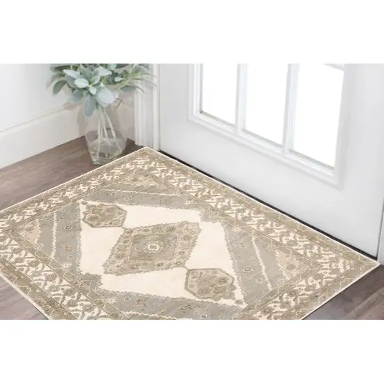 Beige and Ivory Oriental Power Loom Area Rug Photo 1