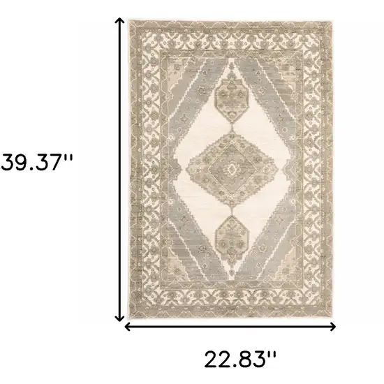 Beige And Ivory Oriental Power Loom Stain Resistant Area Rug Photo 5