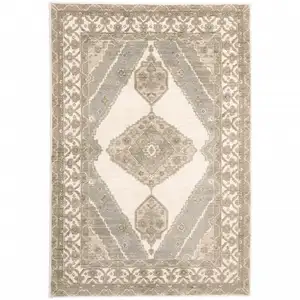 Photo of Beige And Ivory Oriental Power Loom Stain Resistant Area Rug