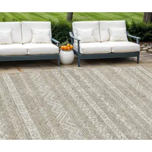 Photo of Beige And Ivory Southwestern Washable Indoor Outdoor Area Rug