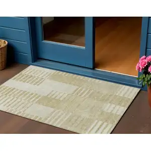 Photo of Beige And Ivory Striped Washable Indoor Outdoor Area Rug