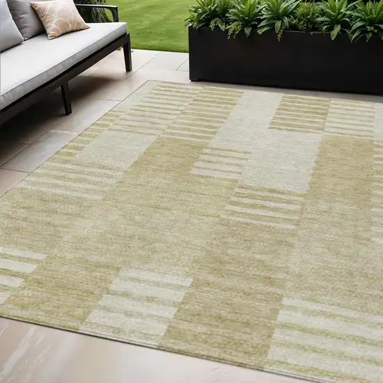 Beige And Ivory Striped Washable Indoor Outdoor Area Rug Photo 1