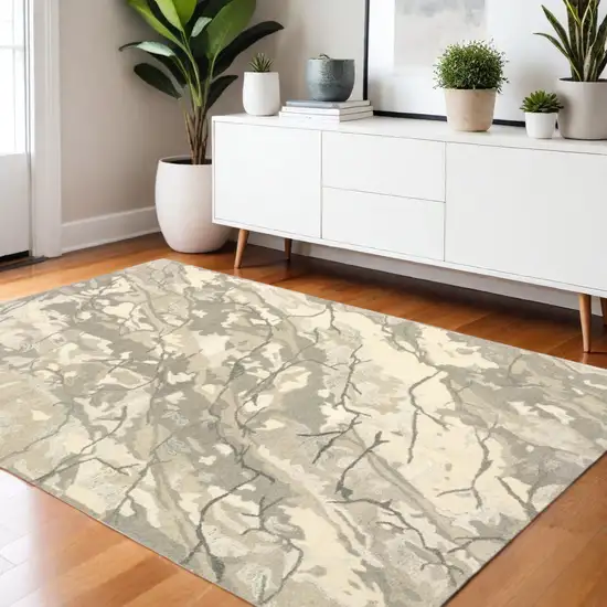 Beige And Ivory Wool Abstract Hand Tufted Area Rug Photo 1