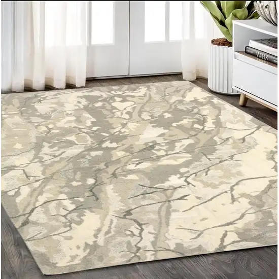 Beige And Ivory Wool Abstract Hand Tufted Area Rug Photo 1