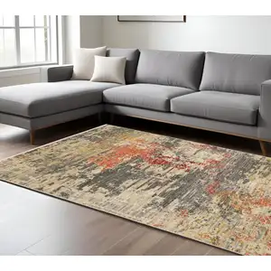 Photo of Beige And Pink Abstract Area Rug With Fringe