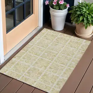 Photo of Beige And Tan Medallion Washable Indoor Outdoor Area Rug