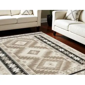 Photo of Beige Black And Tan Geometric Flatweave Area Rug