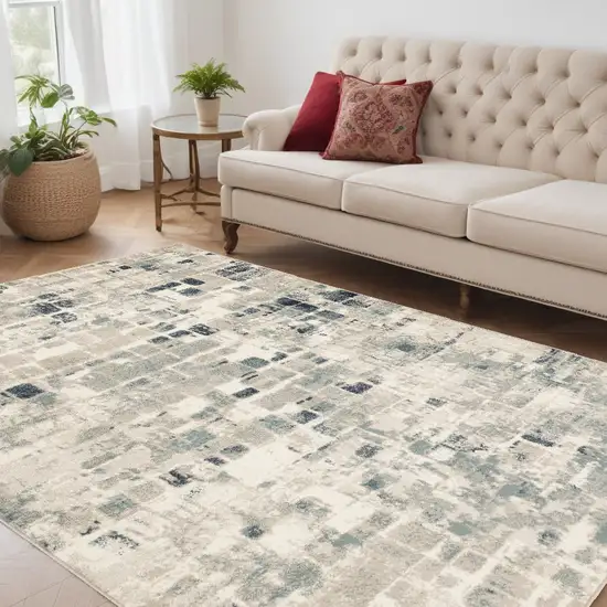 Blue and Beige Abstract Area Rug Photo 1