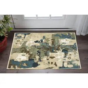 Photo of Beige Blue And Brown Abstract Area Rug