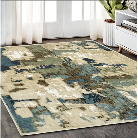 Beige Blue And Brown Abstract Area Rug Photo 1