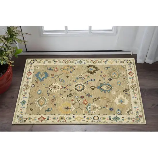 Beige Blue And Red Oriental Area Rug With Fringe Photo 1