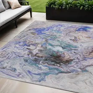 Photo of Beige Blue And Taupe Abstract Washable Indoor Outdoor Area Rug