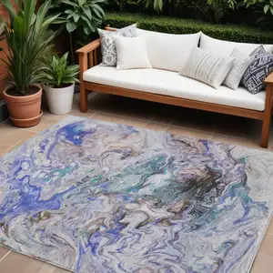 Photo of Beige Blue And Taupe Abstract Washable Indoor Outdoor Area Rug