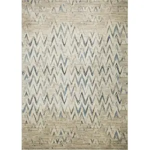 Photo of Beige Blue Distressed Chevron Area Rug