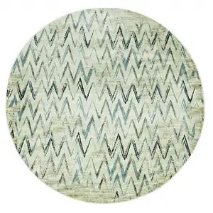 Photo of Beige Blue Distressed Chevron Area Rug