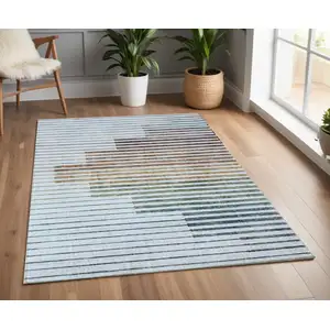 Photo of Beige Blue and Brown Striped Area Rug