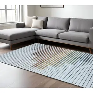 Photo of Beige Blue and Brown Striped Area Rug