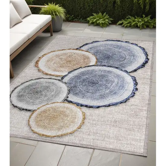 Beige Blue and Gold Faux Bois Washable Non Skid Indoor Outdoor Area Rug Photo 1