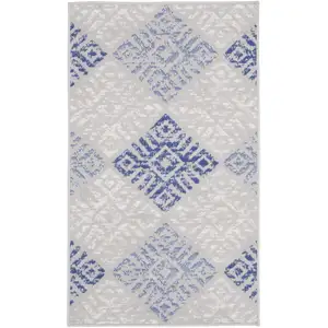 Photo of Beige Blue and Gray Geometric Area Rug