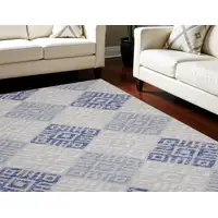 Photo of Beige Blue and Gray Geometric Distressed Non Skid Area Rug