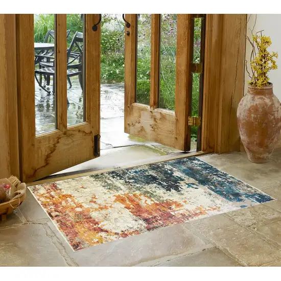 Beige Blue and Ivory Abstract Distressed Area Rug With Fringe Photo 1