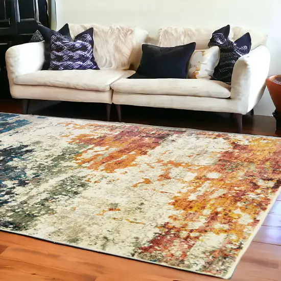 Beige Blue and Ivory Abstract Distressed Area Rug With Fringe Photo 1