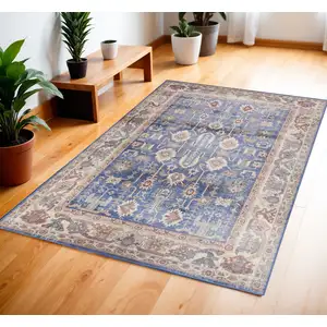 Photo of Beige Blue and Red Oriental Distressed Non Skid Area Rug