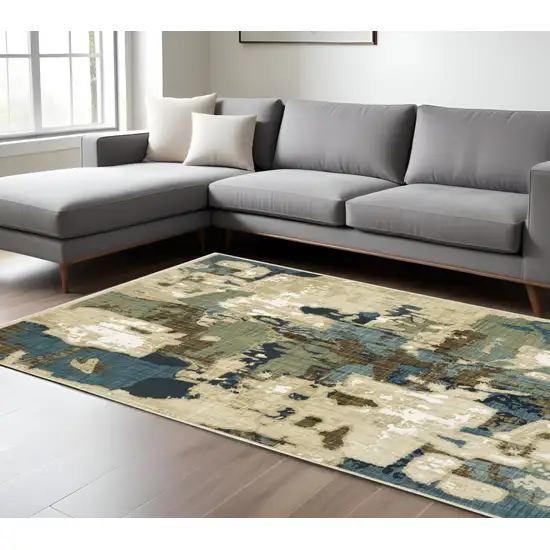 Beige Brown And Blue Abstract Area Rug Photo 1