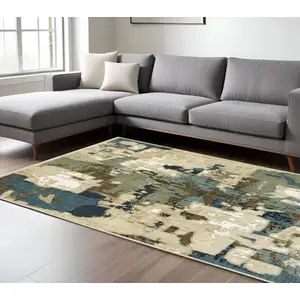 Photo of Beige Brown And Blue Abstract Area Rug