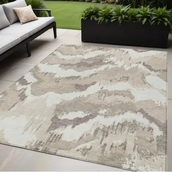 Beige Brown And Ivory Abstract Washable Indoor Outdoor Area Rug Photo 1