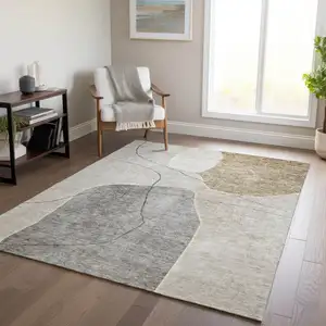 Photo of Beige Brown And Taupe Abstract Washable Indoor Outdoor Area Rug