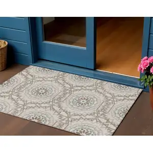 Photo of Beige Brown And Teal Blue Floral Medallion Washable Indoor Outdoor Area Rug